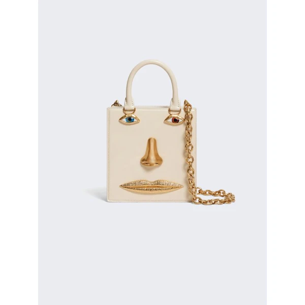 Schiaparelli nose bag
