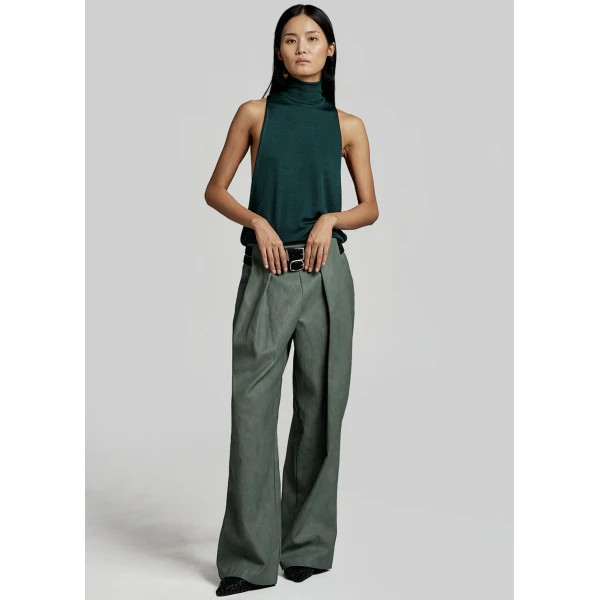 The Frankie Shop Olivet Faux Leather Trousers - Moss Green - Oversized Minimalist Pants in Green - Shop at Luxury Shoes 