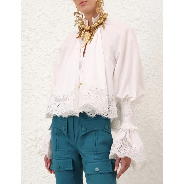 Elevate your elegance in this Zimmermann Tops available now at Luxury Shoes 