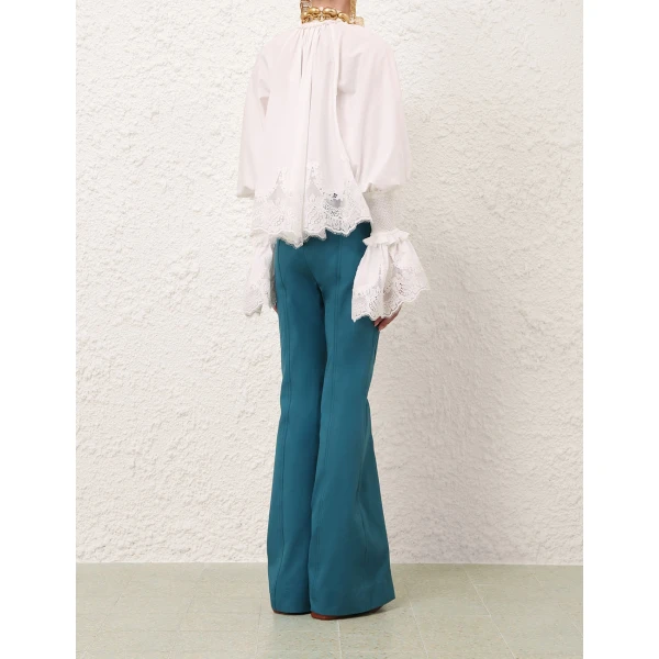 Elevate your elegance in this Zimmermann Tops available now at Luxury Shoes 