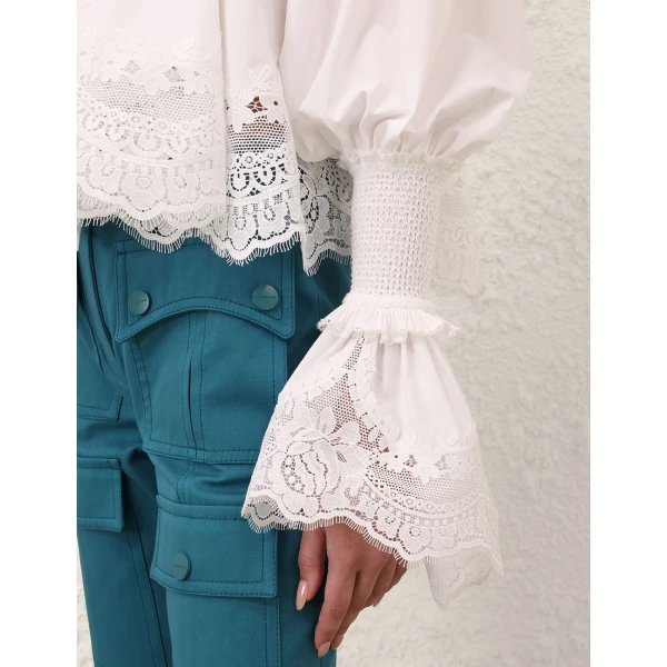 Elevate your elegance in this Zimmermann Tops available now at Luxury Shoes 