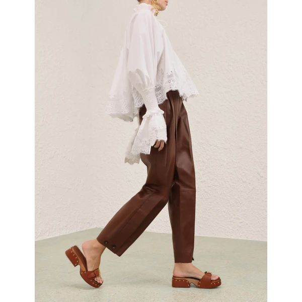 Elevate your elegance in this Zimmermann Tops available now at Luxury Shoes 