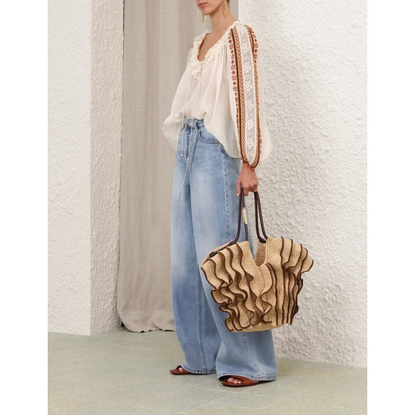 Elevate your elegance in this Zimmermann Tops available now at Luxury Shoes 