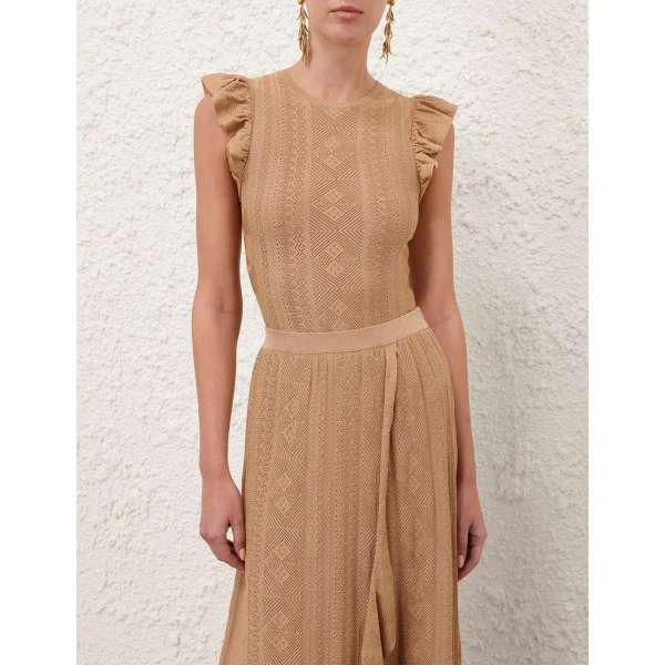 Elevate your elegance in this Zimmermann Tops available now at Luxury Shoes 