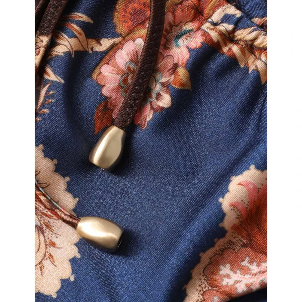 Elevate your elegance in this Zimmermann Beachwear available now at Luxury Shoes 