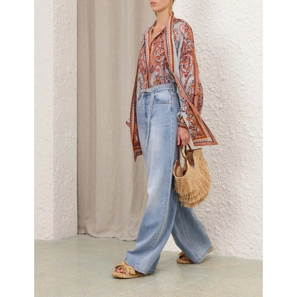 Elevate your elegance in this Zimmermann Tops available now at Luxury Shoes 
