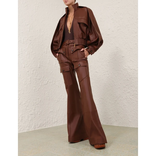 Elevate your elegance in this Zimmermann Bodysuit available now at Luxury Shoes 