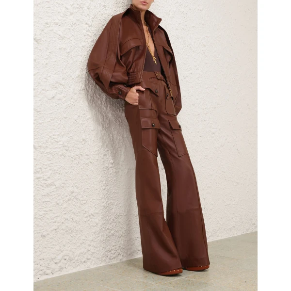 Elevate your elegance in this Zimmermann Bodysuit available now at Luxury Shoes 