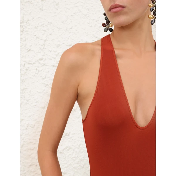 Elevate your elegance in this Zimmermann Bodysuit available now at Luxury Shoes 