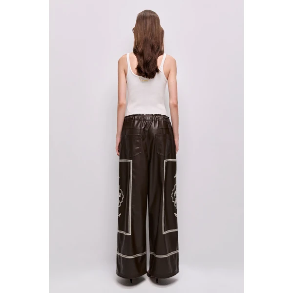 Aje Aus Pants – structured silhouette with raw femininity from Luxury Shoes 