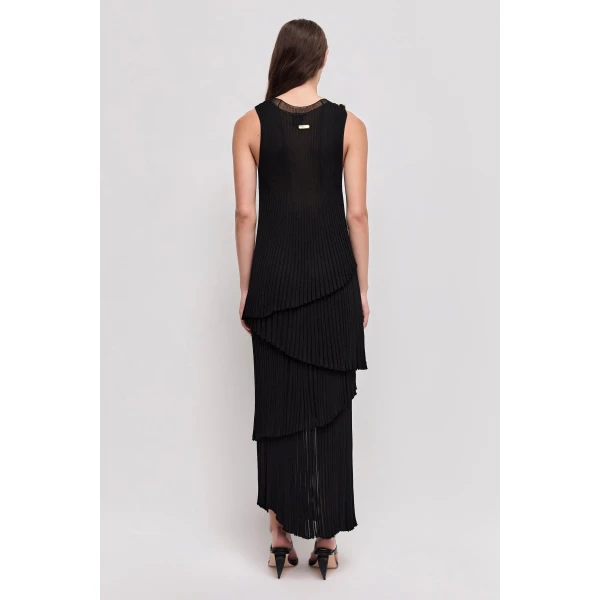Aje Aus Tops – structured silhouette with raw femininity from Luxury Shoes 