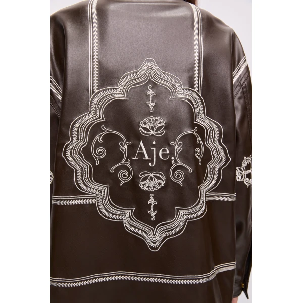 Aje Aus Tops – structured silhouette with raw femininity from Luxury Shoes 
