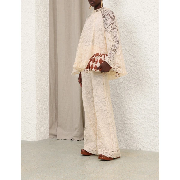 Elevate your elegance in this Zimmermann Tops available now at Luxury Shoes 