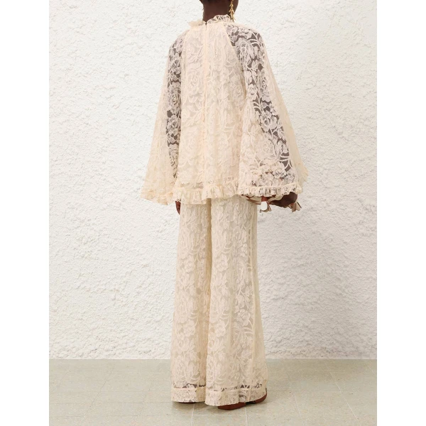 Elevate your elegance in this Zimmermann Tops available now at Luxury Shoes 