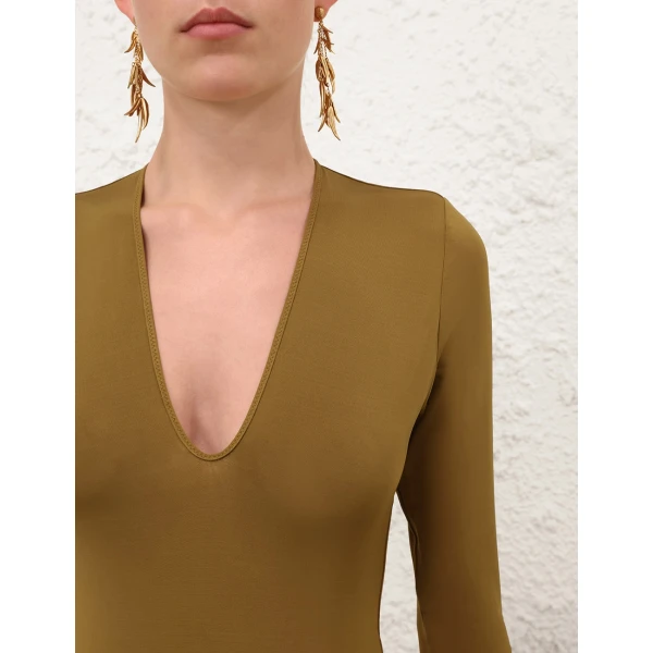 Elevate your elegance in this Zimmermann Bodysuit available now at Luxury Shoes 