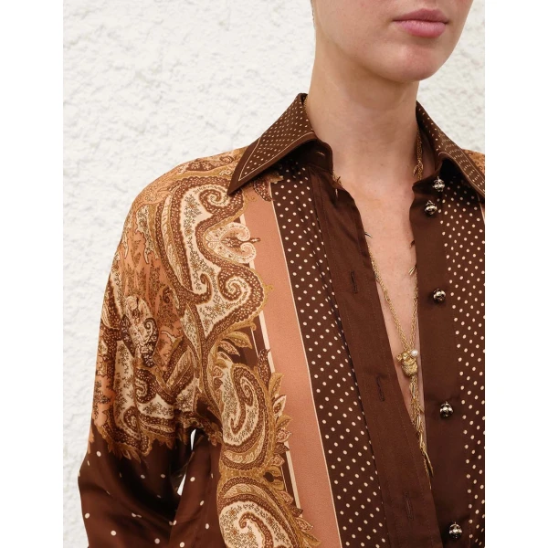 Elevate your elegance in this Zimmermann Tops available now at Luxury Shoes 