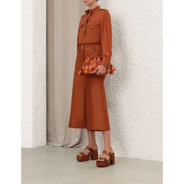 Elevate your elegance in this Zimmermann Tops available now at Luxury Shoes 