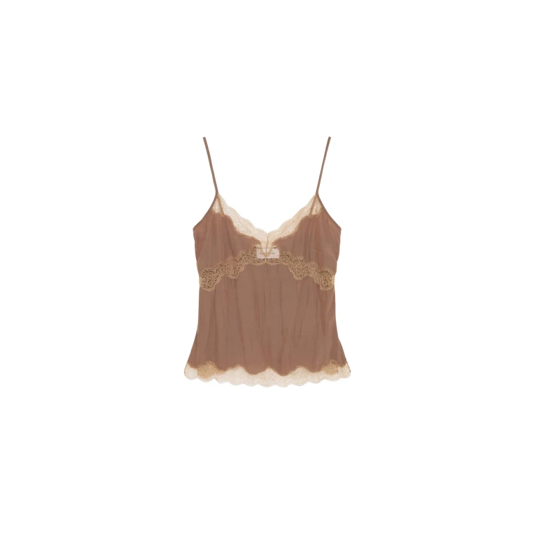 Elevate your elegance in this 16Arlington Tops from the luxury feather dress edit