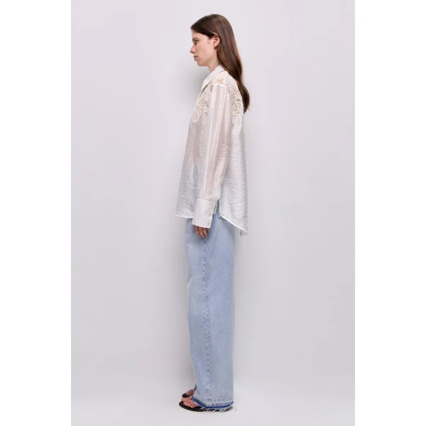 Aje Aus Tops – structured silhouette with raw femininity from Luxury Shoes 