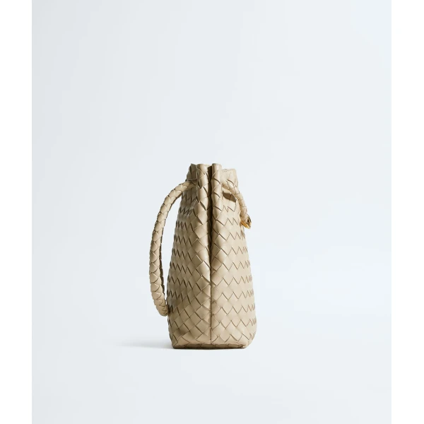 Khaite Women's Andiamo Small Bucket in Ecru - Beige Bucket Bags - The Lotus Tote Bag - Shop at Luxury Shoes 
