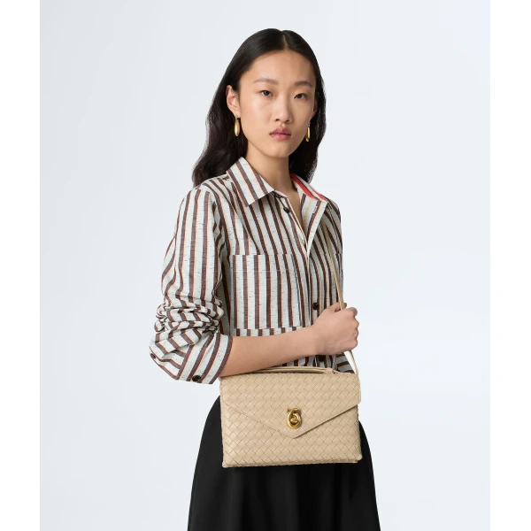 Khaite Women's Knot Lock in Ecru - Beige Clutch Bags - The Lotus Tote Bag - Shop at Luxury Shoes 
