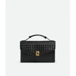 Khaite Women's Knot Lock in Black - Black Clutch Bags - The Lotus Tote Bag - Shop at Luxury Shoes 