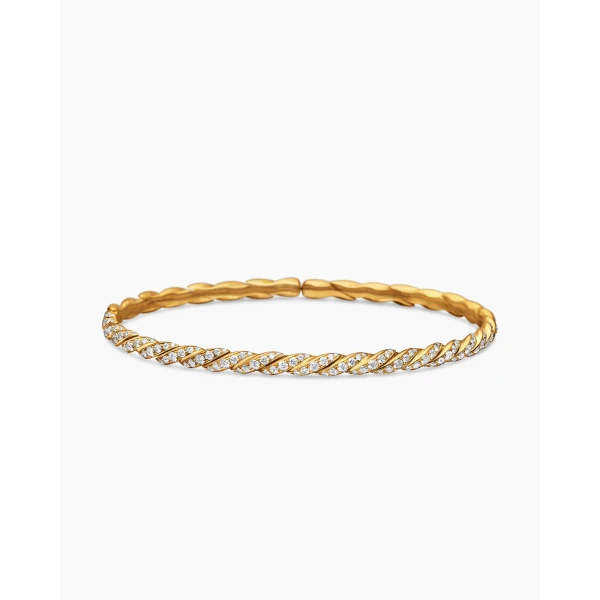 on-model styling shot|David Yurman Sculpted Cable Flex Bracelet in 18K Yellow Gold with Diamonds