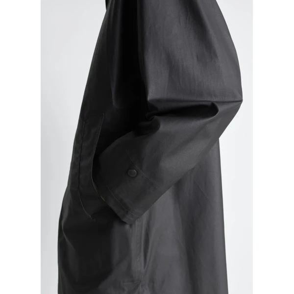 Lemaire Raincoat in Resinated Cotton - Coats - Parisian Minimalist Luxury at Luxury Shoes 