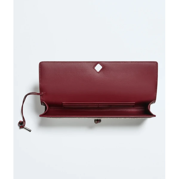 Khaite Women's Andiamo Clutch in White/lava red - Multicolour Clutch Bags - The Lotus Tote Bag - Shop at Luxury Shoes 