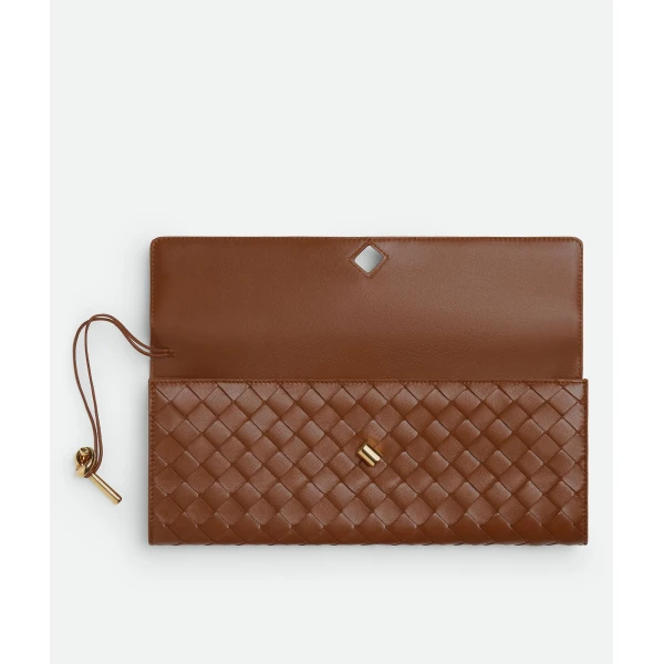 Khaite Women's Andiamo Clutch in Amber - Orange Clutch Bags - The Lotus Tote Bag - Shop at Luxury Shoes 
