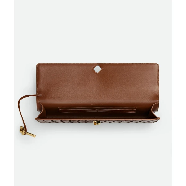 Khaite Women's Andiamo Clutch in Amber - Orange Clutch Bags - The Lotus Tote Bag - Shop at Luxury Shoes 