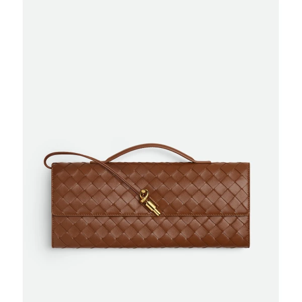 Khaite Women's Andiamo Clutch in Amber - Orange Clutch Bags - The Lotus Tote Bag - Shop at Luxury Shoes 