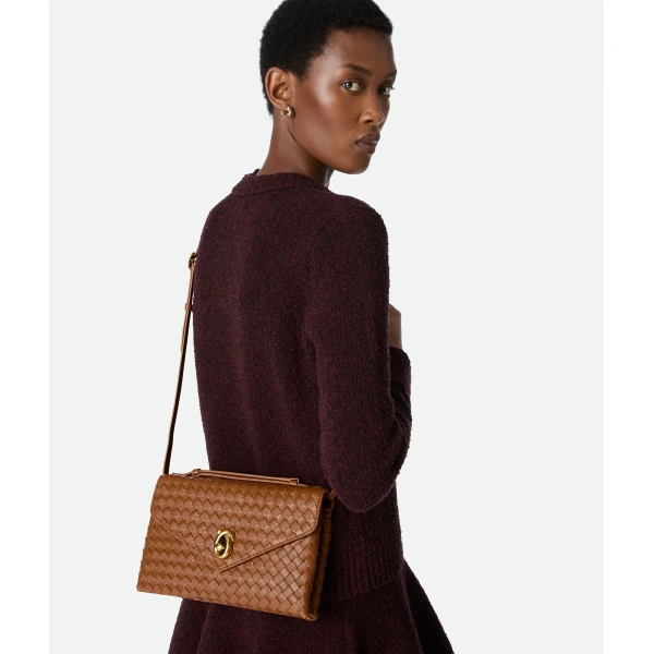 Khaite Women's Knot Lock in Amber - Orange Clutch Bags - The Lotus Tote Bag - Shop at Luxury Shoes 