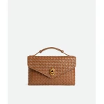 Khaite Women's Knot Lock in Amber - Orange Clutch Bags - The Lotus Tote Bag - Shop at Luxury Shoes 