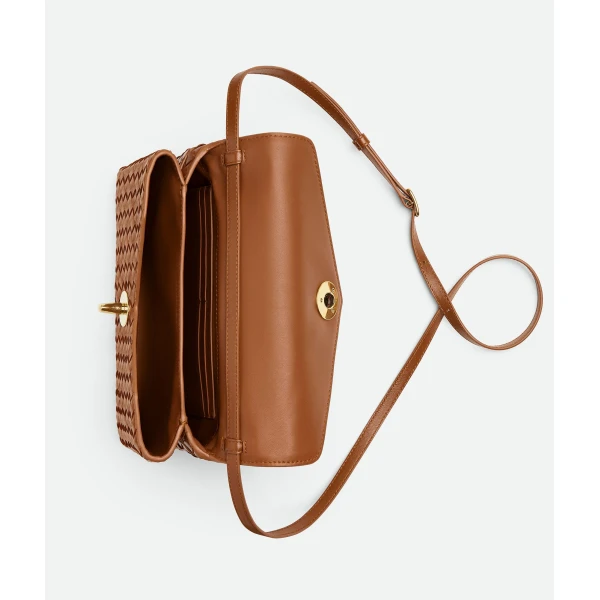 Khaite Women's Knot Lock in Amber - Orange Clutch Bags - The Lotus Tote Bag - Shop at Luxury Shoes 