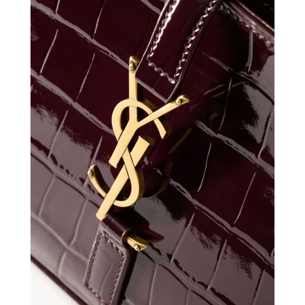 Saint Laurent LE 5 À 7 in crocodile-embossed patent leather designed in Paris