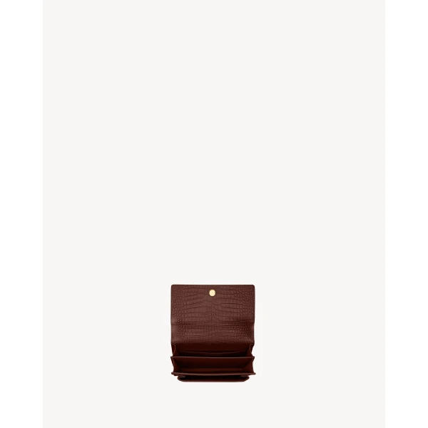 Saint Laurent SUNSET MEDIUM IN CROCODILE-EMBOSSED LEATHER designed in Paris