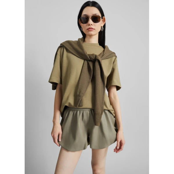 The Frankie Shop Alina Faux Leather Bubble Hem Shorts - Sage - Oversized Minimalist Shorts in Green - Shop at Luxury Shoes 