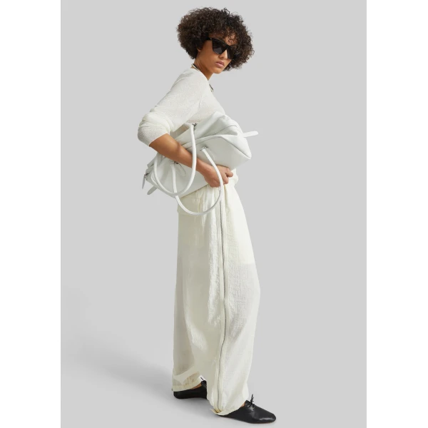 The Frankie Shop Articulated Vented Pants - Milk - Oversized Minimalist Pants in White - Shop at Luxury Shoes 