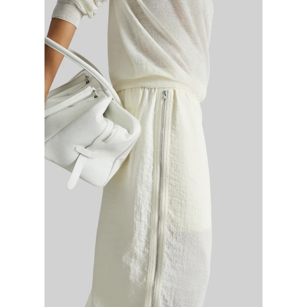 The Frankie Shop Articulated Vented Pants - Milk - Oversized Minimalist Pants in White - Shop at Luxury Shoes 