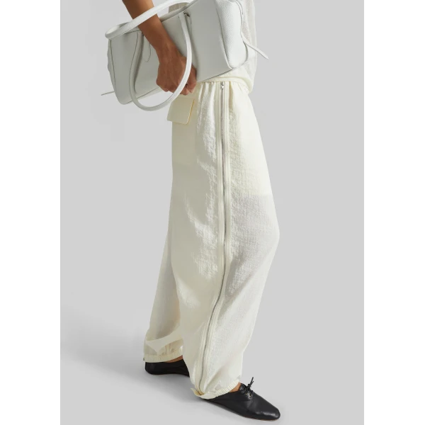 The Frankie Shop Articulated Vented Pants - Milk - Oversized Minimalist Pants in White - Shop at Luxury Shoes 