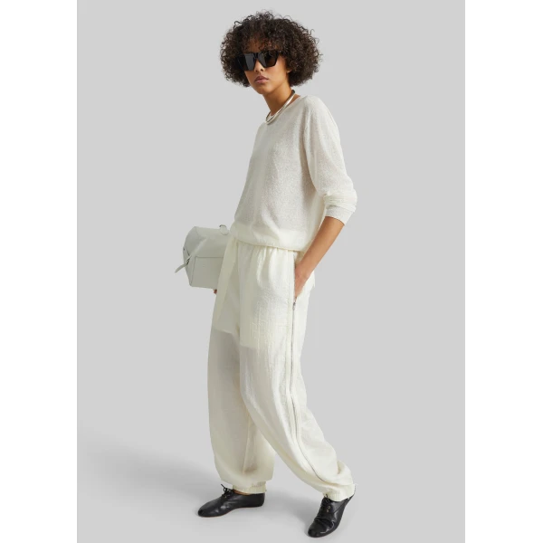 The Frankie Shop Articulated Vented Pants - Milk - Oversized Minimalist Pants in White - Shop at Luxury Shoes 