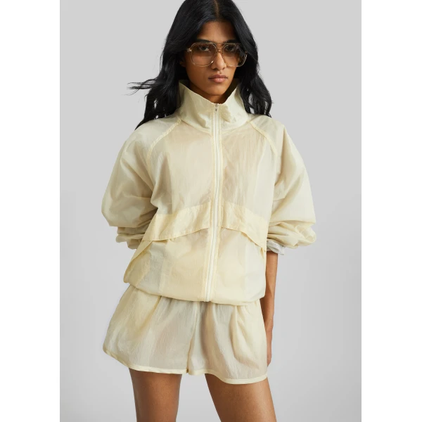 The Frankie Shop Bicos Sheer Mini Track Shorts - Pale Yellow - Oversized Minimalist Shorts in Yellow - Shop at Luxury Shoes 