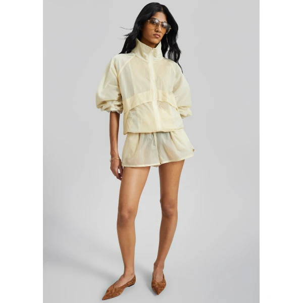 The Frankie Shop Bicos Sheer Mini Track Shorts - Pale Yellow - Oversized Minimalist Shorts in Yellow - Shop at Luxury Shoes 