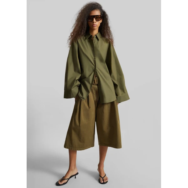 The Frankie Shop Garment Dye Pleated Culotte - Avocado - Oversized Minimalist Shorts in Green - Shop at Luxury Shoes 