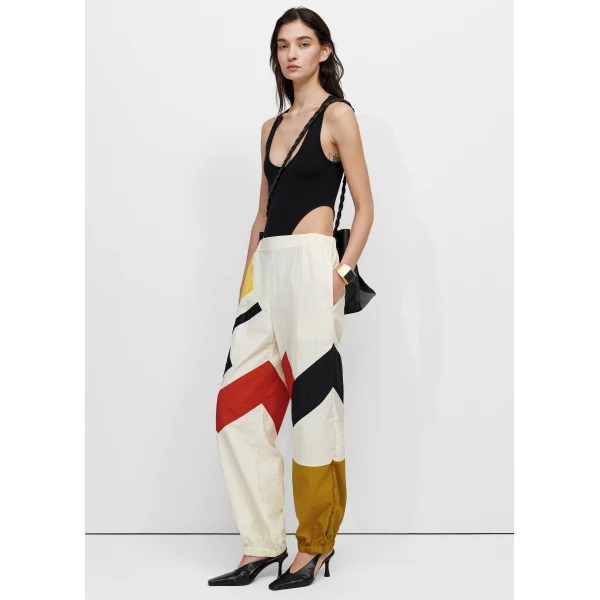 The Frankie Shop Malevich Track Pants - Vanilla - Oversized Minimalist Pants in Ivory - Shop at Luxury Shoes 