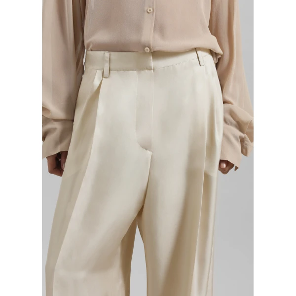 The Frankie Shop Marfa Pleated Silk Trousers - Light Beige - Oversized Minimalist Pants in Beige - Shop at Luxury Shoes 