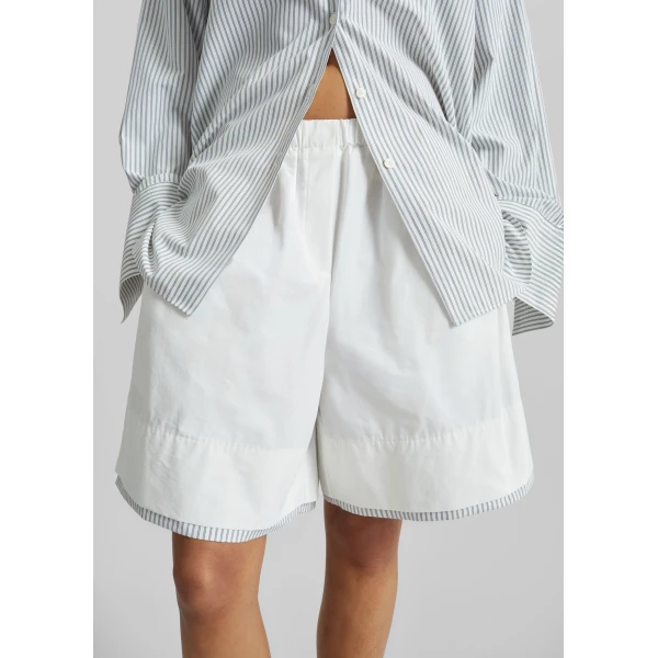 The Frankie Shop Menton Layered Hem Shorts - White/Blue Stripe - Oversized Minimalist Shorts in Multicolour - Shop at Luxury Shoes 