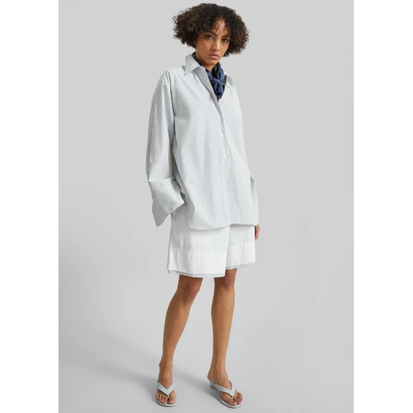 The Frankie Shop Menton Layered Hem Shorts - White/Blue Stripe - Oversized Minimalist Shorts in Multicolour - Shop at Luxury Shoes 