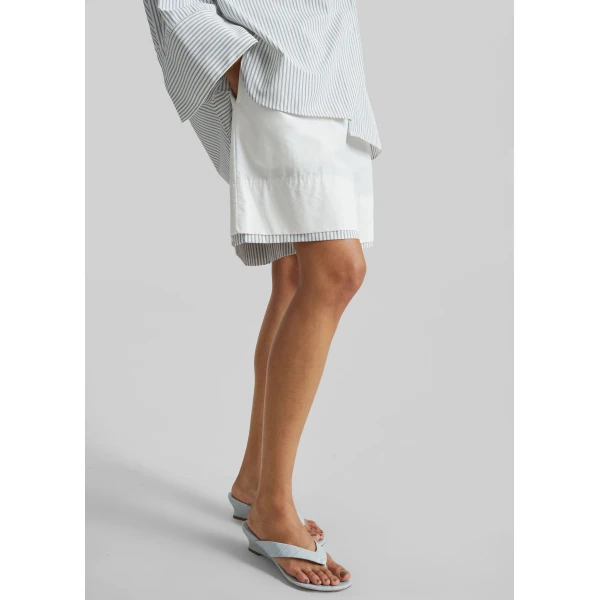 The Frankie Shop Menton Layered Hem Shorts - White/Blue Stripe - Oversized Minimalist Shorts in Multicolour - Shop at Luxury Shoes 